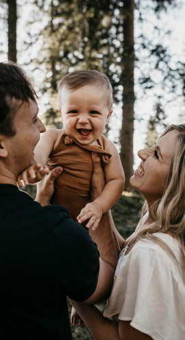 Parents with children in Saint Louis planning education savings and long-term financial goals with advisor